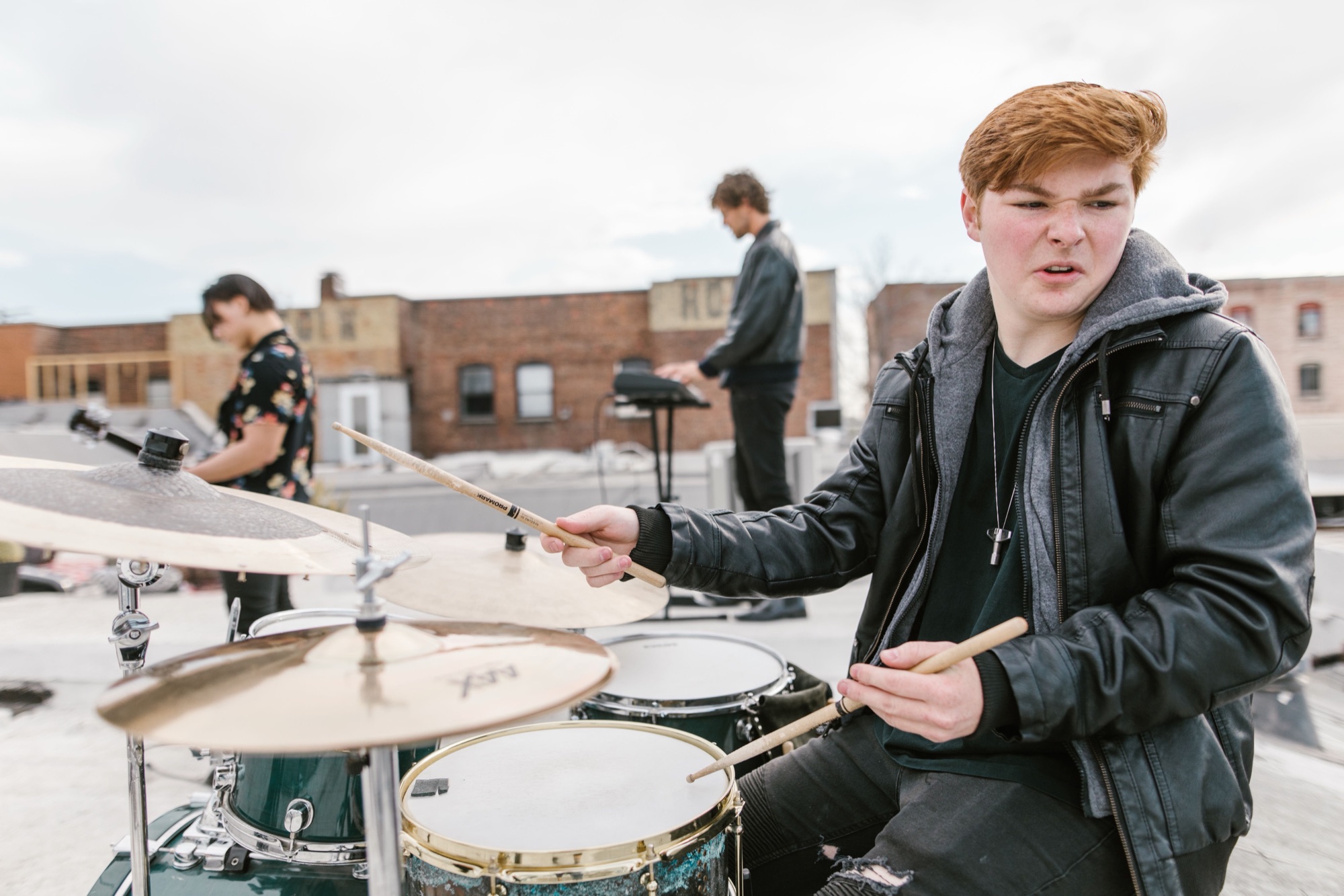 Young band playing on a rooftop