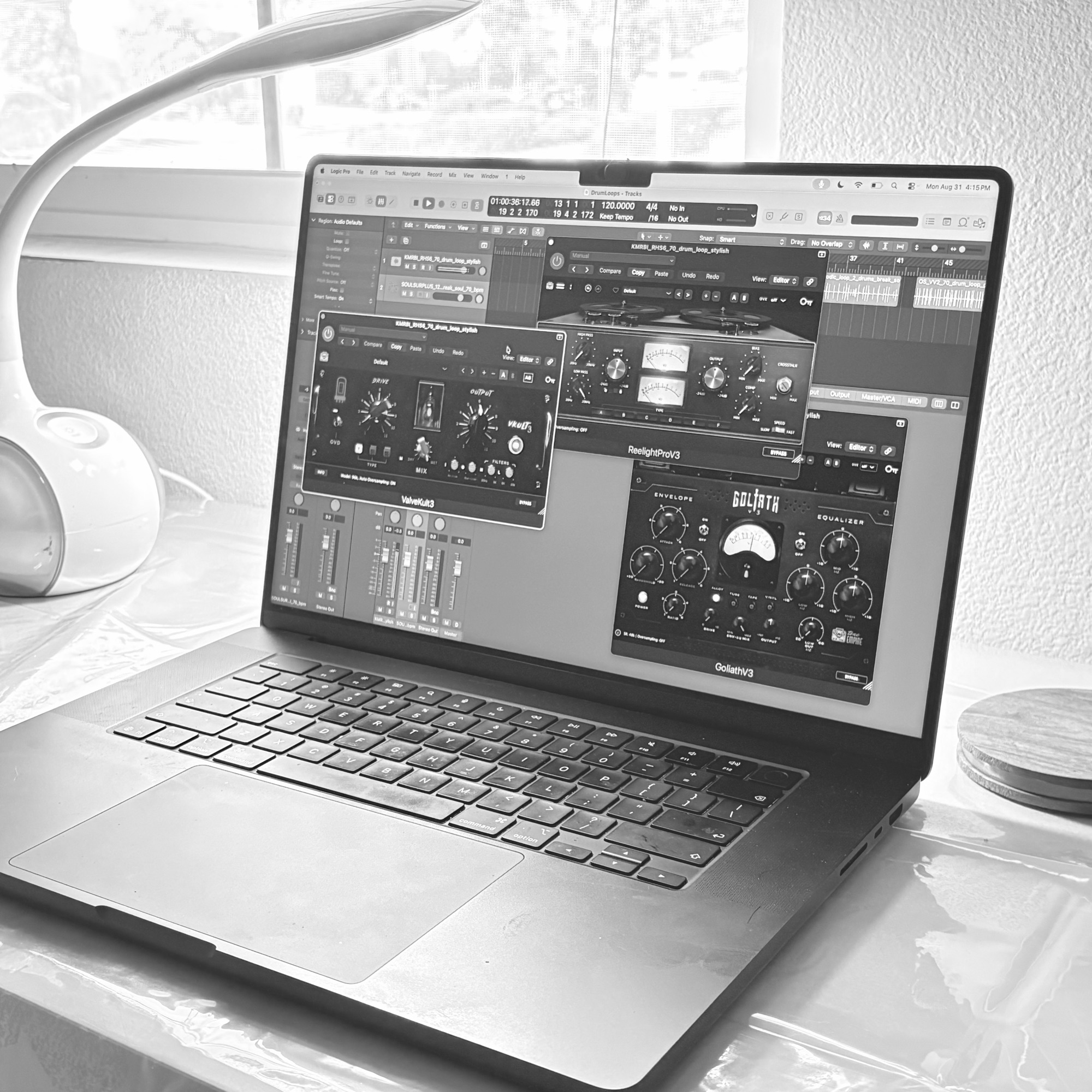 Laptop running Tone Empire plugins in a DAW session